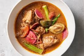 Sinigang na Lechon! A Tangy and Comforting Fusion of Filipino Flavors